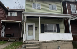 Great 2 bed 2 bath with bonus attic space house located steps from shopping.