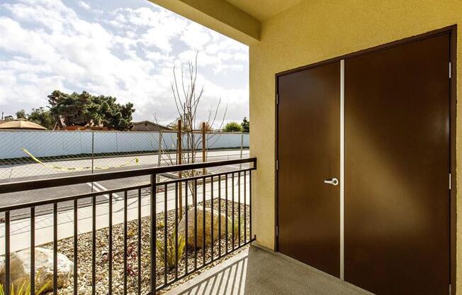 Spacious balcony to put outdoor furniture and extra storage on the side doors