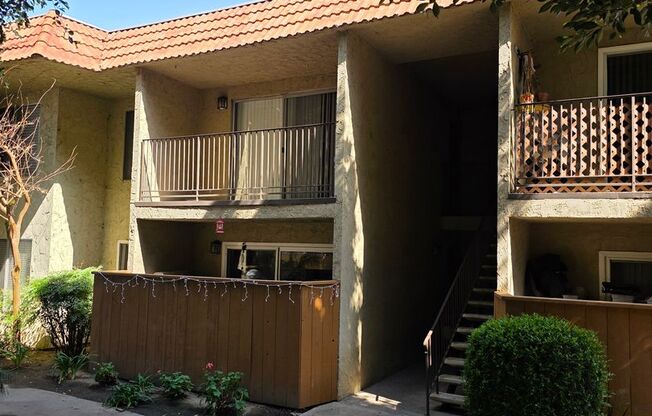 Renovated upstairs 2 bedroom 2 bath condo in a gate community available now
