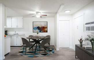 a dining area with a round table and four chairs at Kirkwood Meadows, Pocatello, ID 83201