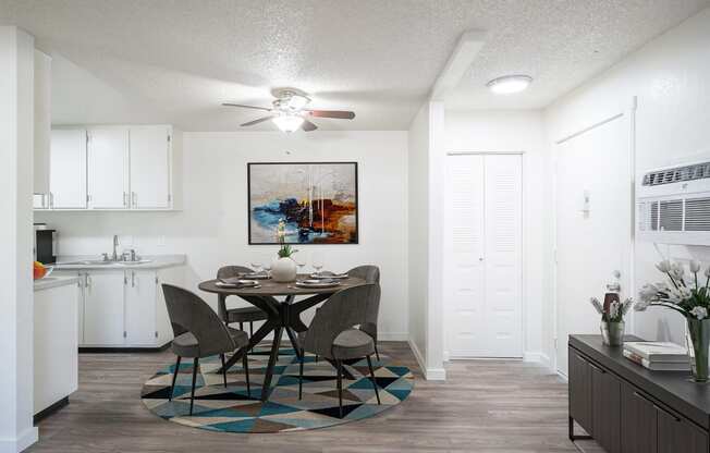 a dining area with a round table and four chairs at Kirkwood Meadows, Pocatello, ID 83201