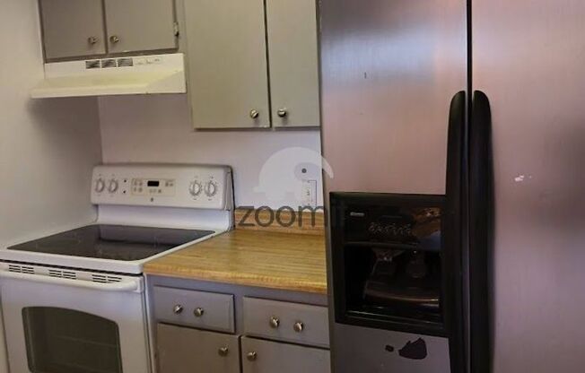 Charming Two-Level Townhome – Freshly Updated and Move-In Ready!