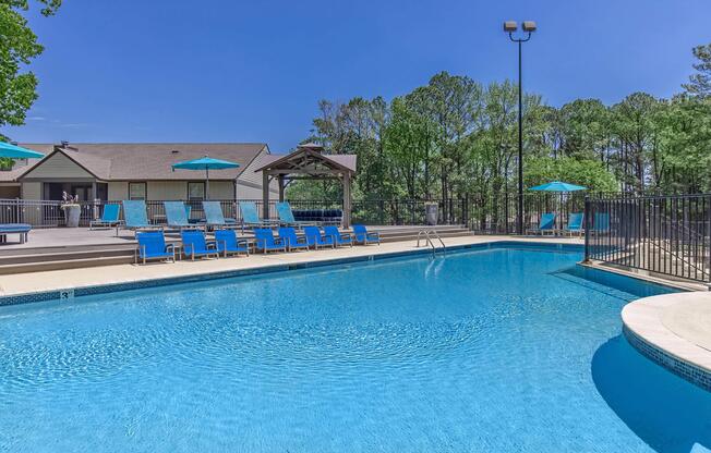 Soak up the sun at the sparkling swimming pool at Madison Landing at Research in Madison, AL