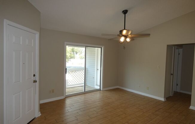 Updated Upstairs Unit with Vaulted Ceilings, Modern Kitchen, and Community Pool Access!