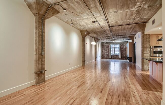 Evolve Real Estate: Stunning Urban Loft 2 Beds/2 Baths in The Heart of LoDo!