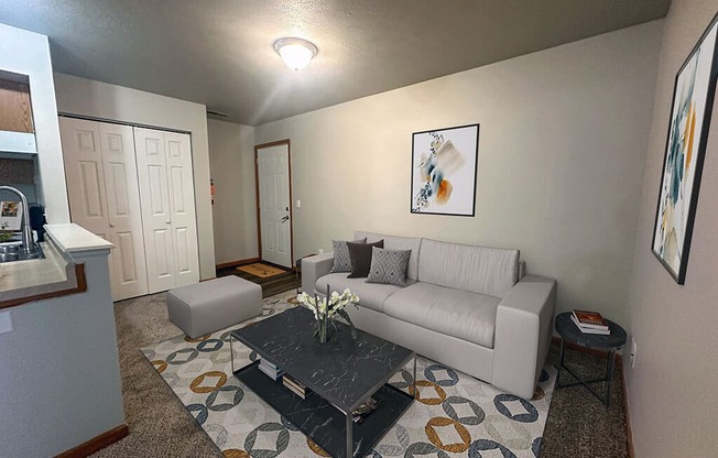 a living room with a couch and a coffee table