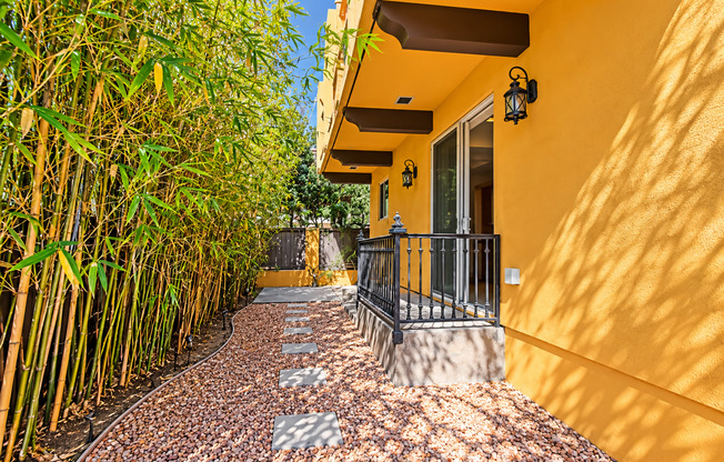 SPACIOUS & SECLUDED, SPANISH MEDITERRANEAN REAR UNIT TOWNHOUSE W/ LARGE ROOFTOP DECK W/ OCEAN/PV VIEWS, 2 BALCONIES, WRAP AROUND YARD & 2-CAR GARAGE ON CUL-DE-SAC STREET CLOSE TO SCHOOLS, SHOPPING, RB PIER & BEACH!