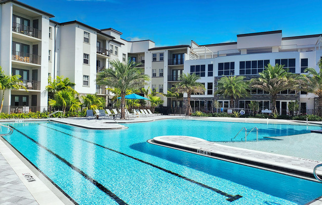 Heated saltwater pool with swim lane, cabanas, sun shelves and WiFi