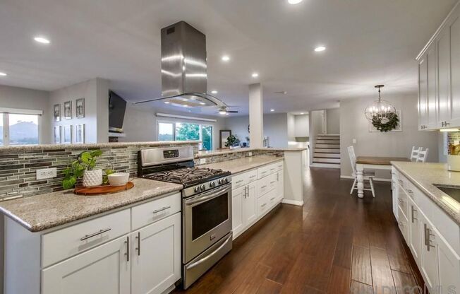 Exquisite Furnished Smart Home in Private Mt. Helix Oasis – Breathtaking Views,  convenience of two ultra-fast EV chargers**, among the fastest on the market, ensuring quick and efficient charging right in your **spacious 5-car driveway**!