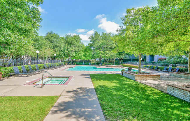 a park with a swimming pool and trees