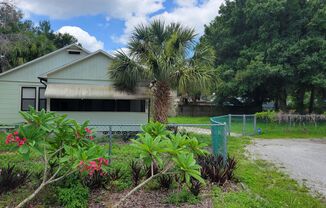 Annual unfurnished updated 2/1 SFH in Sarasota with large fenced in yard.