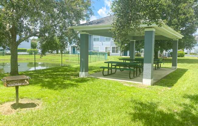 Outdoor grill stations with covered picnic seating