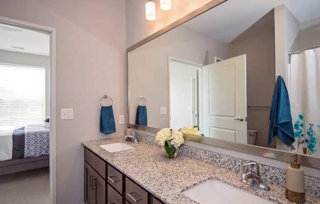 Spacious Bathroom Leading to an Attached Bedroom