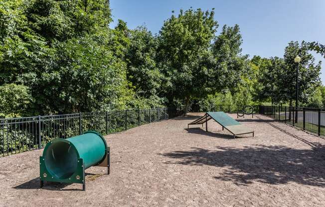 a park with a playground and a picnic table