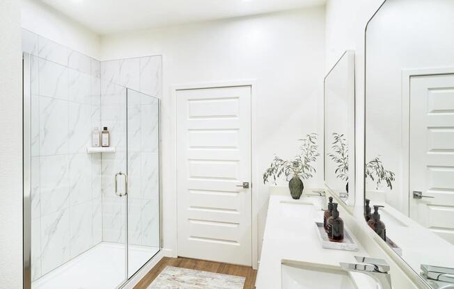 A bright, polished primary bath offering refined finishes and everyday comfort at Modera Encore in Tampa.