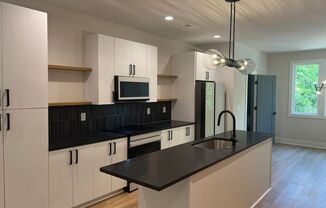 Sophisticated 3BR Urban Townhome with Chef’s Kitchen and Designer Upgrades Throughout!