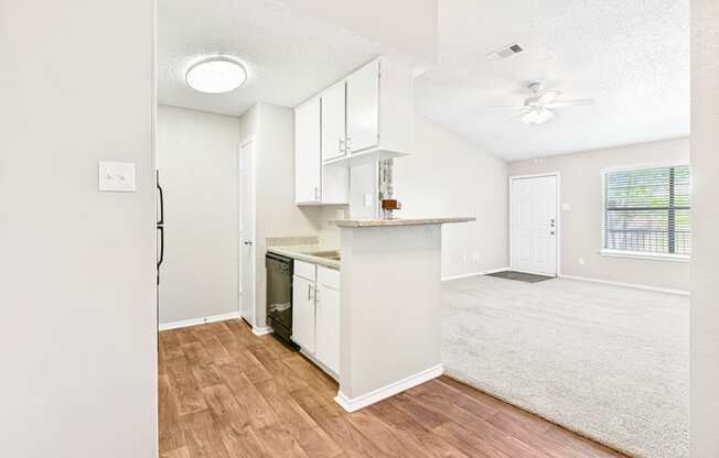 Terrace Unit Kitchen and Dining Room at Bookstone and Terrace Apartments in Irving, Texas