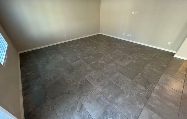 Gorgeous two-story home with 5 bedrooms and 3 bathrooms in a gated community