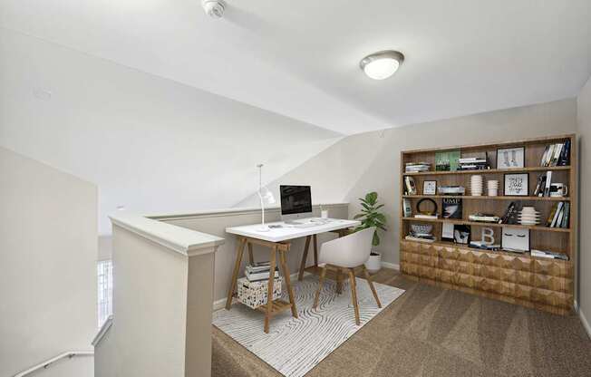 a home office with a desk and a book shelf at MetroPlace at Town Center, Maryland, 20746