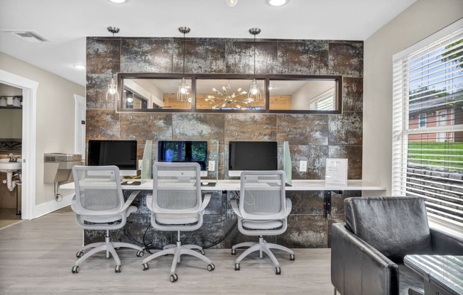 an office with a long desk with computers and chairs at Sunset Ridge, San Antonio, 78209