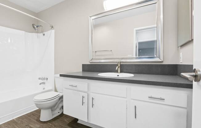 an overhead view of an empty store with white shelves