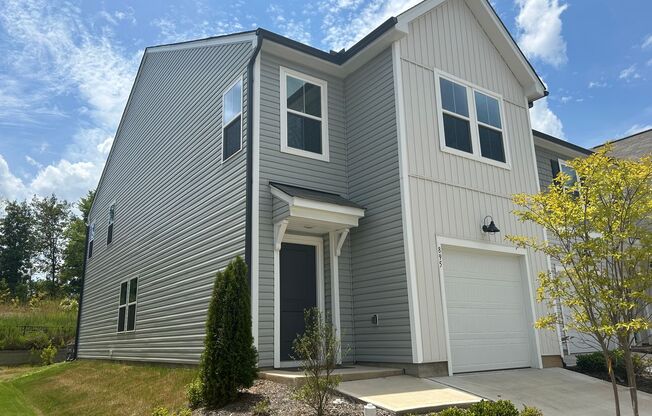 Stunning end-unit newly built 3 bedroom 2.5 bath townhouse in N High Point with attached garage.