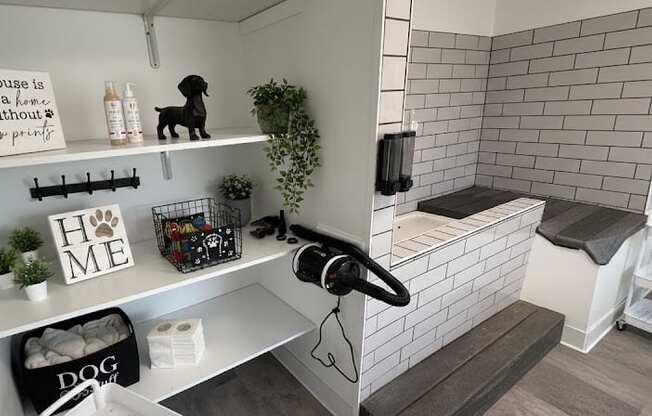 A bathroom with a sign that says "a house is not a farm, so please keep your pets out".