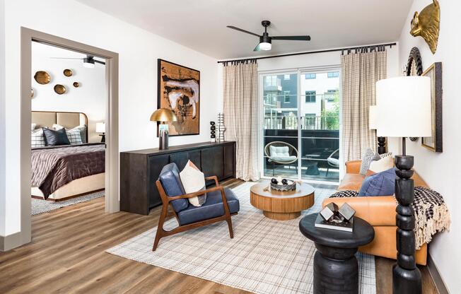 Open-concept living areas feature oversized windows, wood-style plank flooring, and seamless access to private outdoor spaces.