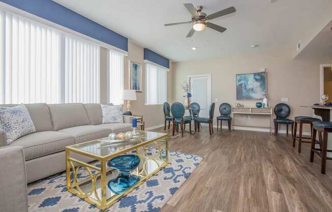 Living Room With Dining Area at The Passage Apartments by Picerne, Henderson, 89014
