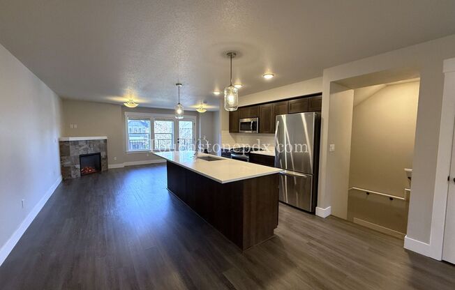 Charming 3 Bed, 2 Bath Townhome with Garage in Beautiful Sandy