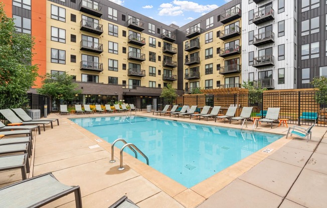 our apartments have a large swimming pool with lounge chairs