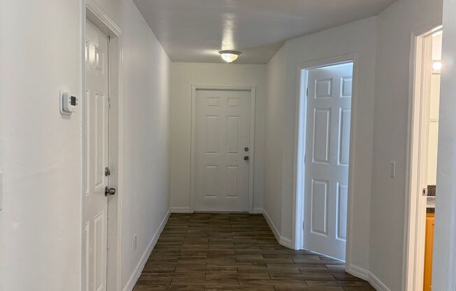 Beautiful wood tile floors! 3 Bed 2 Bath 1 car garage Duplex for rent!