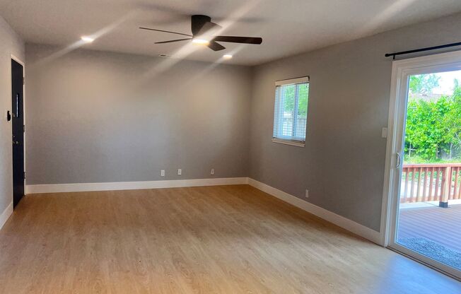Completely Remodeled 4 Bedroom Home with Central AC and Fans in Every Room!