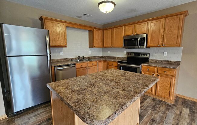 Stylish 3-Story Townhouse in Beautiful Waukee – Move-In Ready