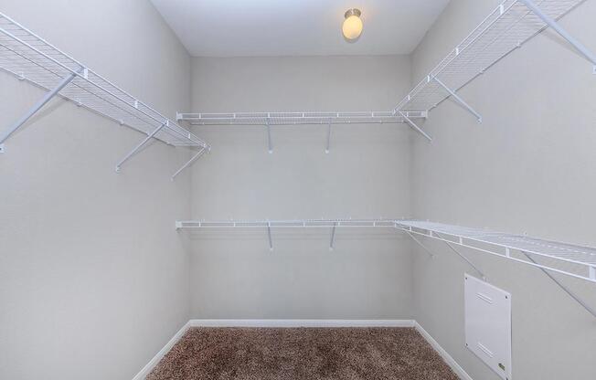 a large white tub next to a shower