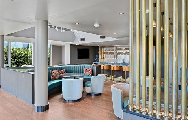 A modern interior with a bar and seating area.