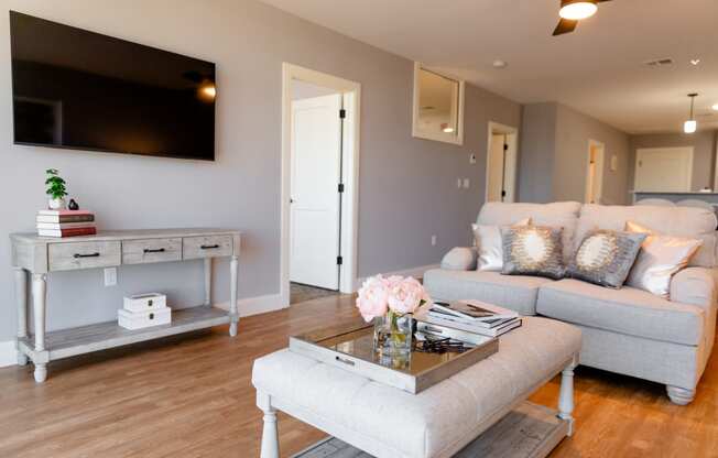 a living room with a couch and a coffee table