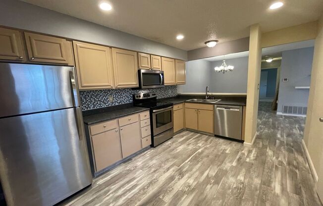 First Level 2 bed Condo Walking distance to Southglen Mall! Utilities included!