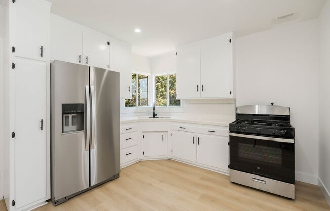 Your Private Yard & Garage Awaits—Only at 15301 Eastwood Ave