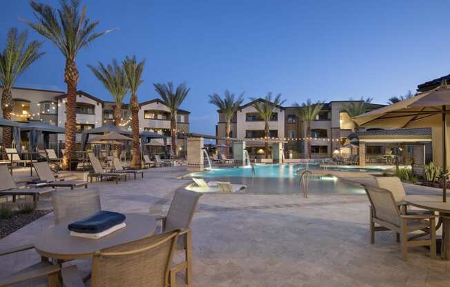 a swimming pool at night at the resort at pedregal