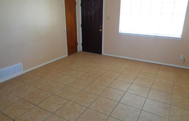 Cute Single Level Northeast Home With Refrigerated Air Located In Quiet Neighborhood