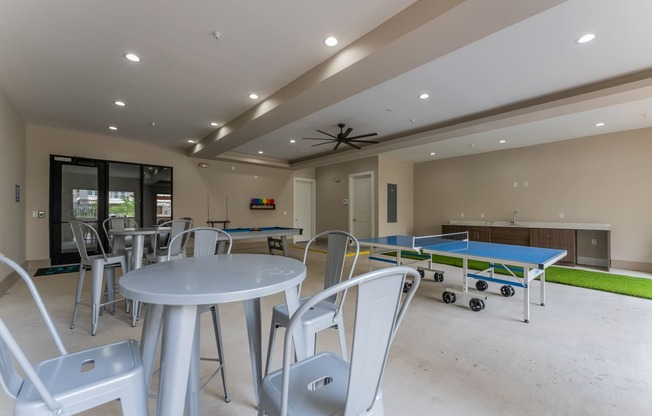 Community Game Room with ping pong tables at Residences at 3000 Bardin Road, Texas