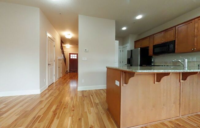 Beautiful 3 Bedroom, 2.5 Bathroom Updated Townhome with Hardwood Floors & Open Floor Plan