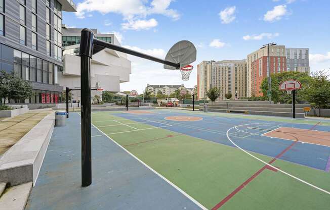 A basketball court with a hoop and a ball on it.