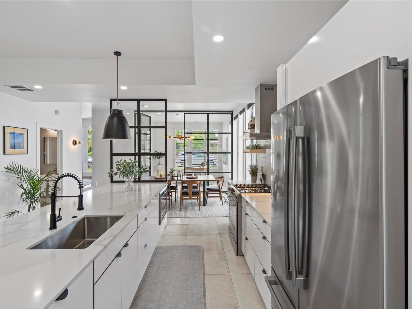 Luxury 4-Bed, 3.5-Bath Denver Home with Rooftop Deck and Dual Primary Suites