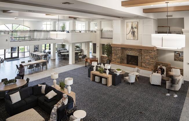 a room filled with furniture and a fireplace