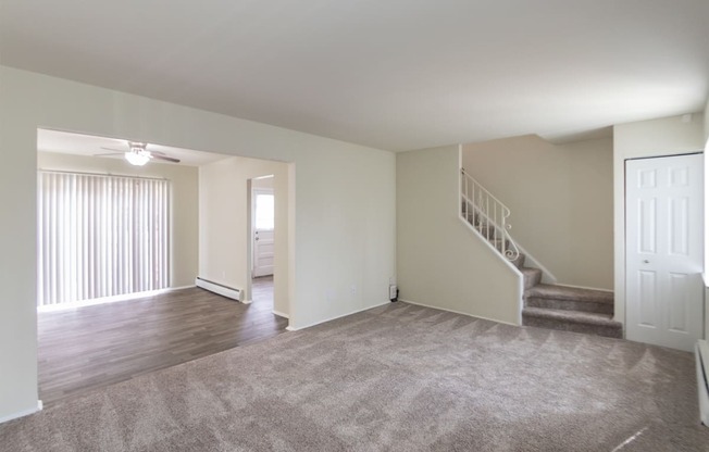 This is a photo of the living room of the 1004 square foot, 2 bedroom/1 bath Townhome with stackable washer/dryer floor plan at Colonial Ridge Apartments in the Pleasant Ridge neighborhood of Cincinnati, OH.