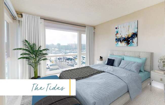 A bedroom with a large bed and a view of the beach at Marina Harbor, California, 90292