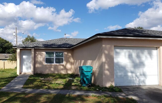 2 BR / 2 BA Condo with Attached Garage and Yard