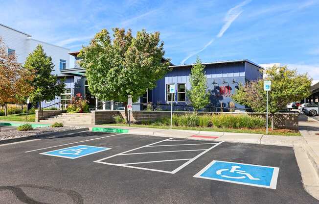 A parking lot with two handicap parking spaces.